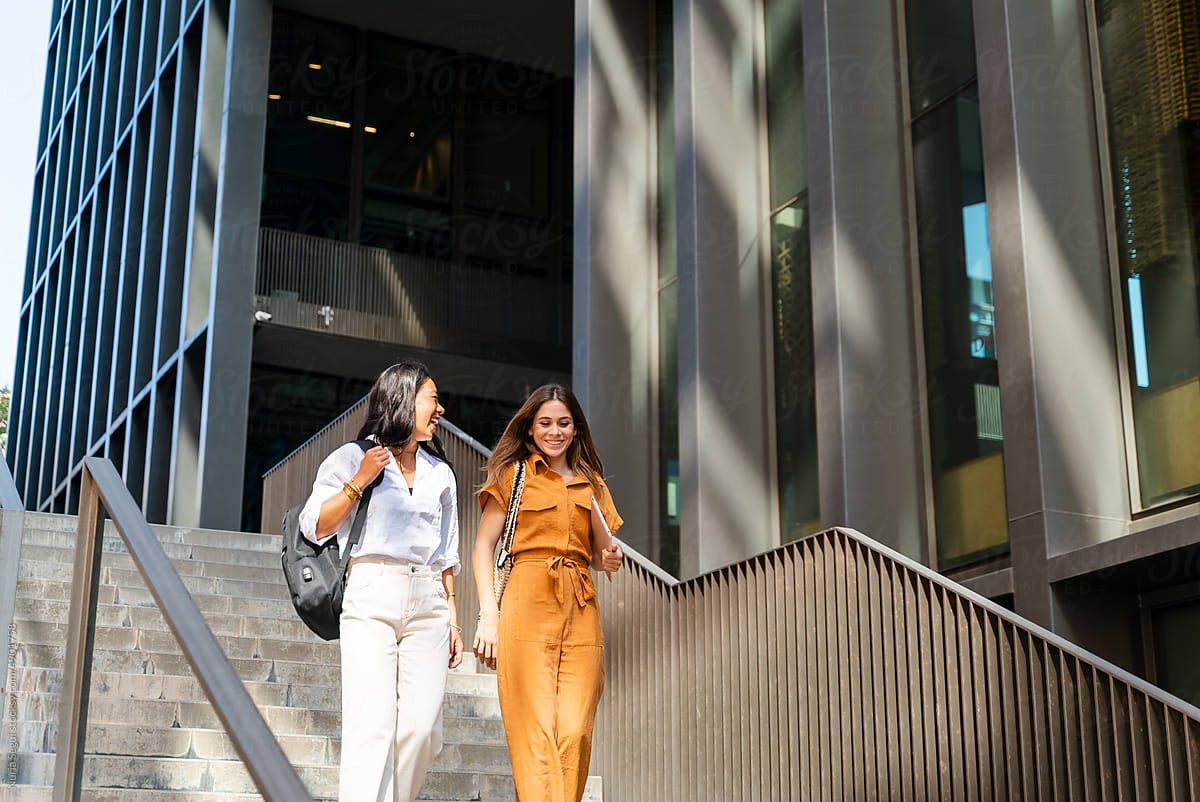 Young Businesswomen Commuting In The City