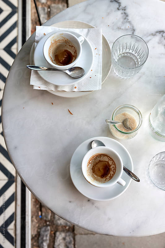 Empty cups of coffee on marble table