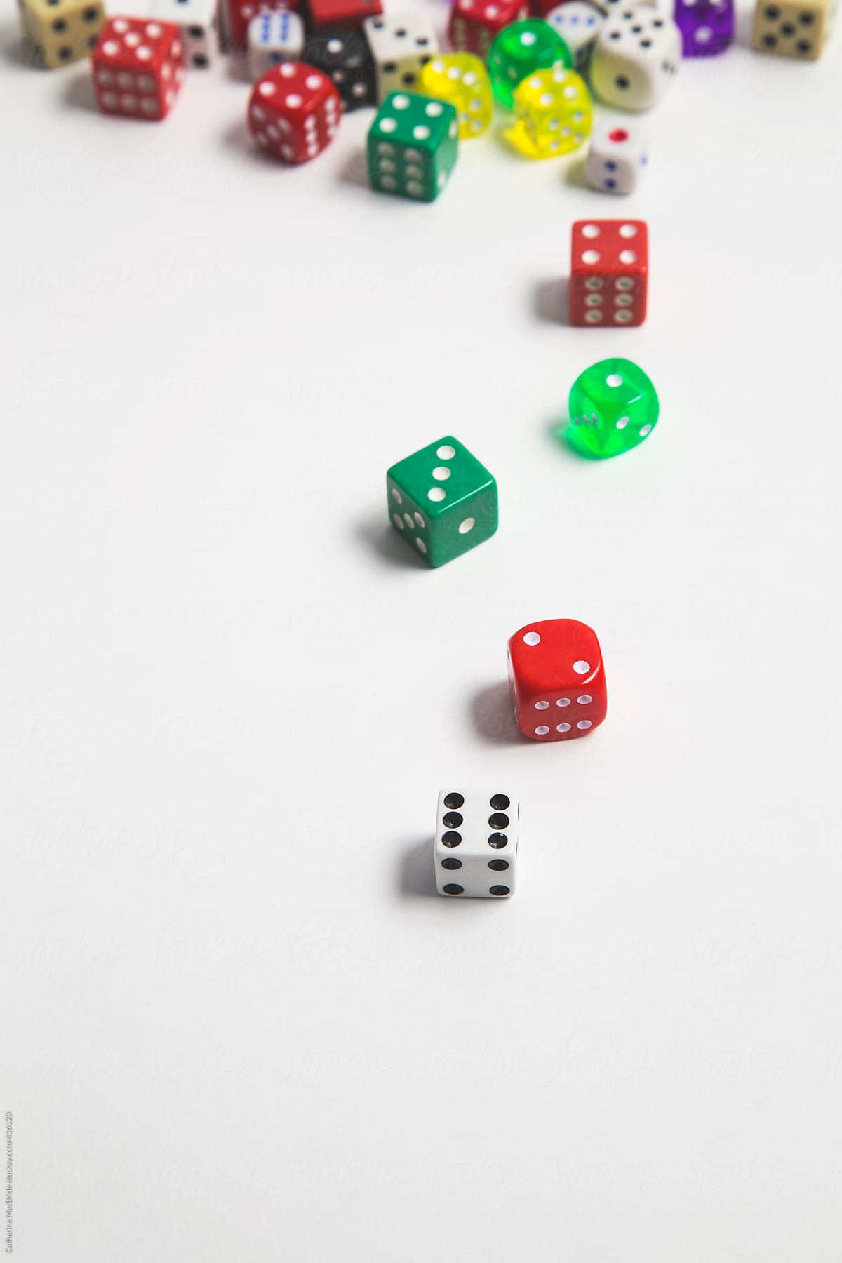 Coloured dice on a white background...