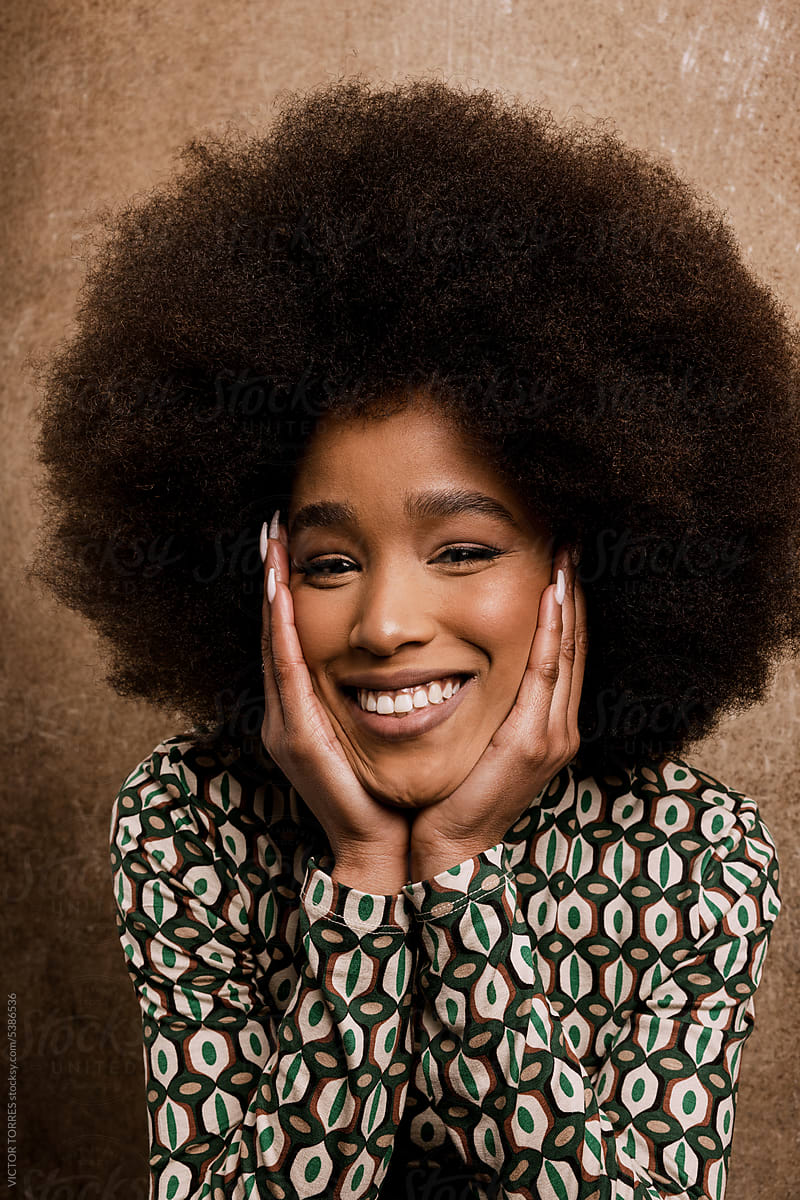 Beautiful happy black woman with afro hair