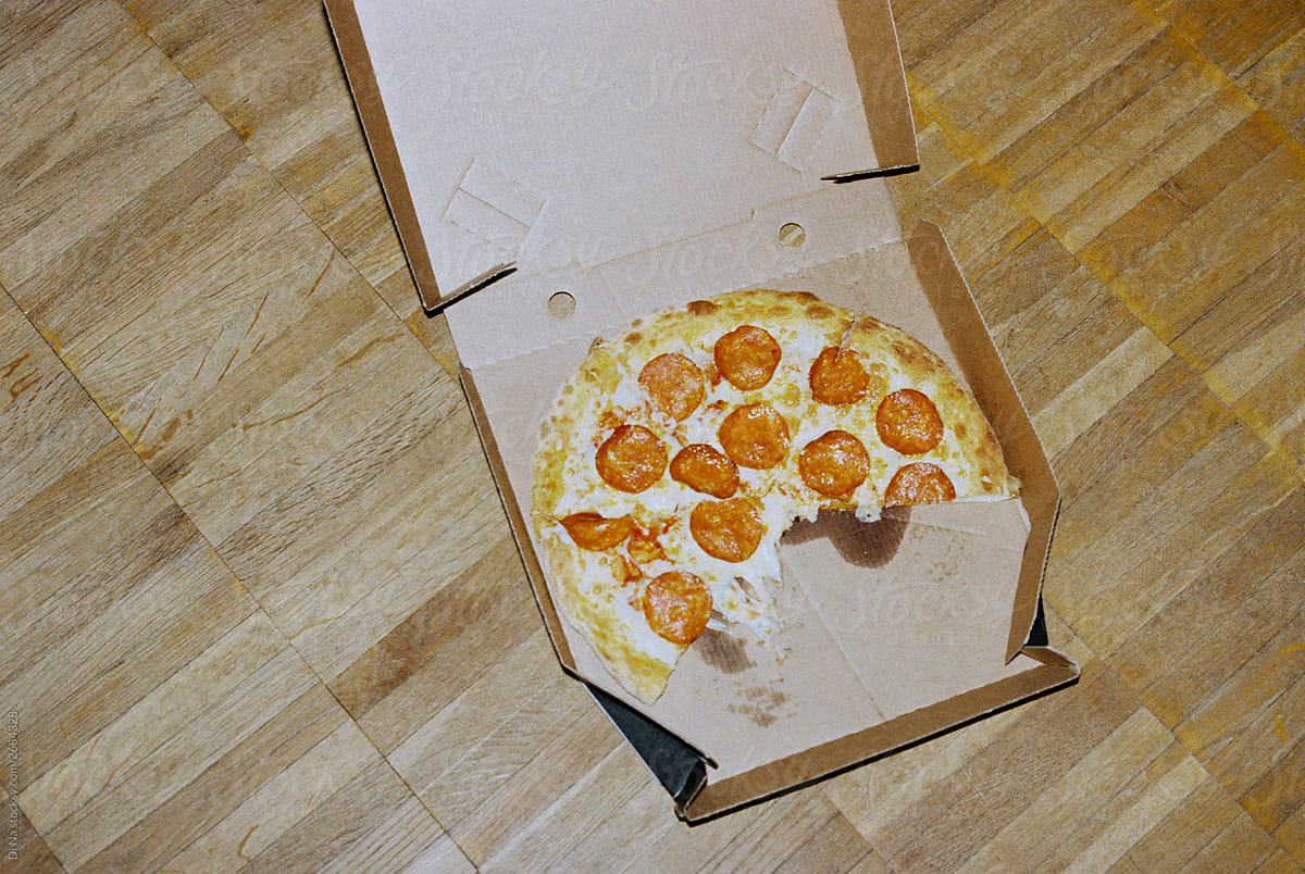 Open Pizza Box With Pepperoni by Stocksy Contributor Synchro Shoot -  Stocksy