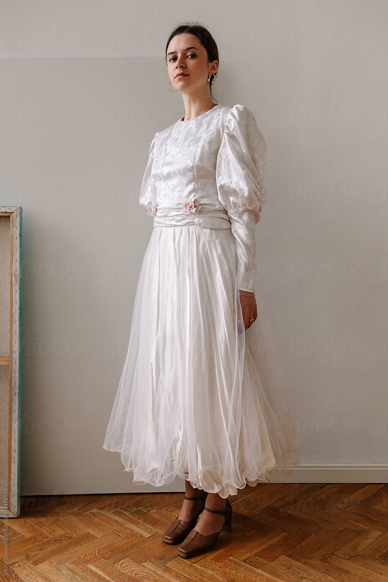 Elegant woman in white dress