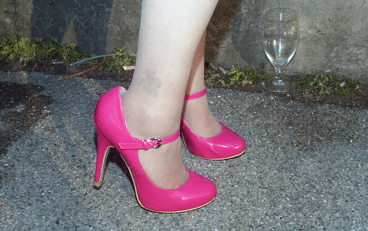 Pink High Heels on Pavement