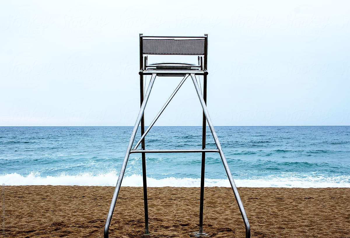 Lifeguard chair on an empty beach.