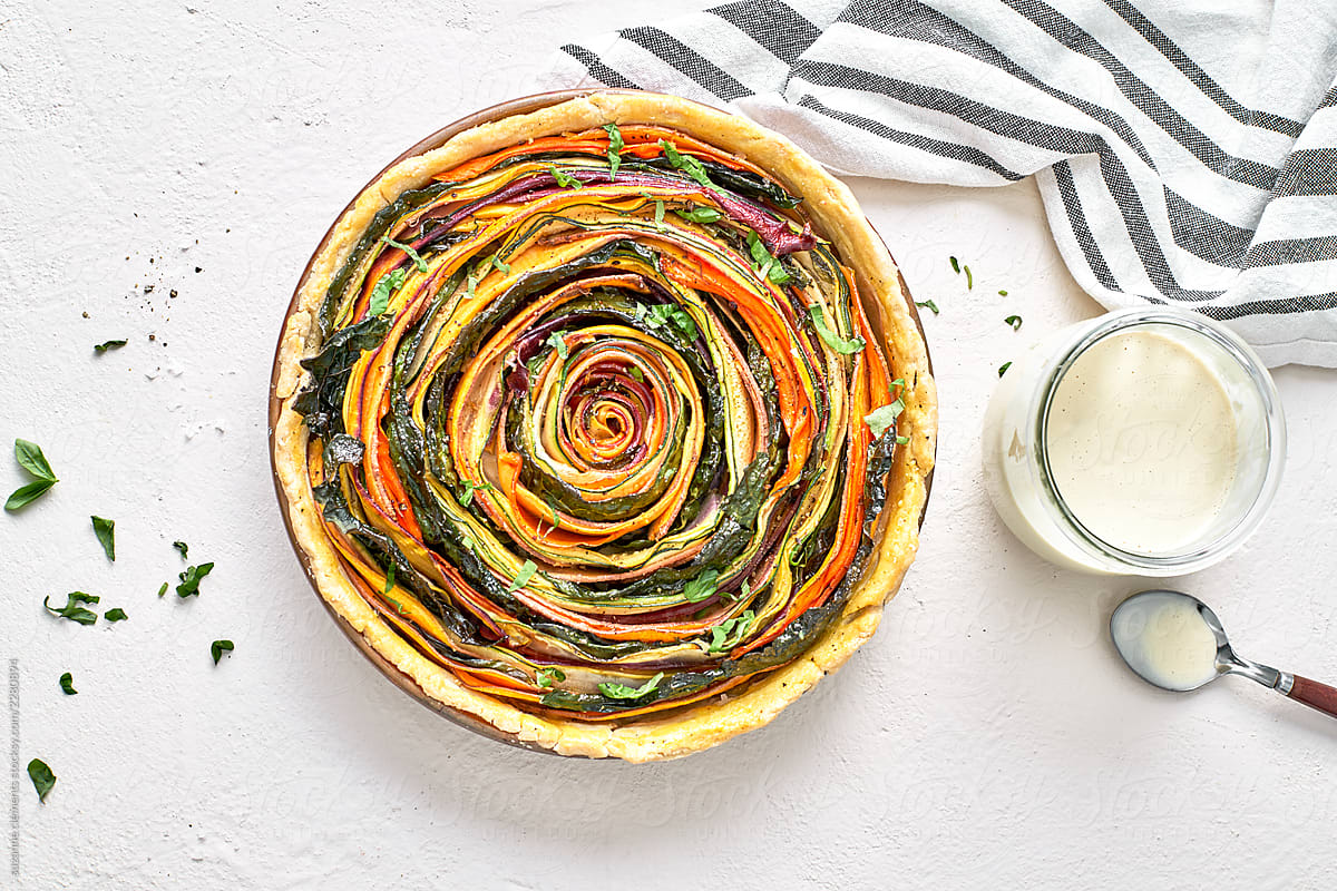 Stock Photo of a Vegan Organic Vegetable Spiral Tart and Cashew