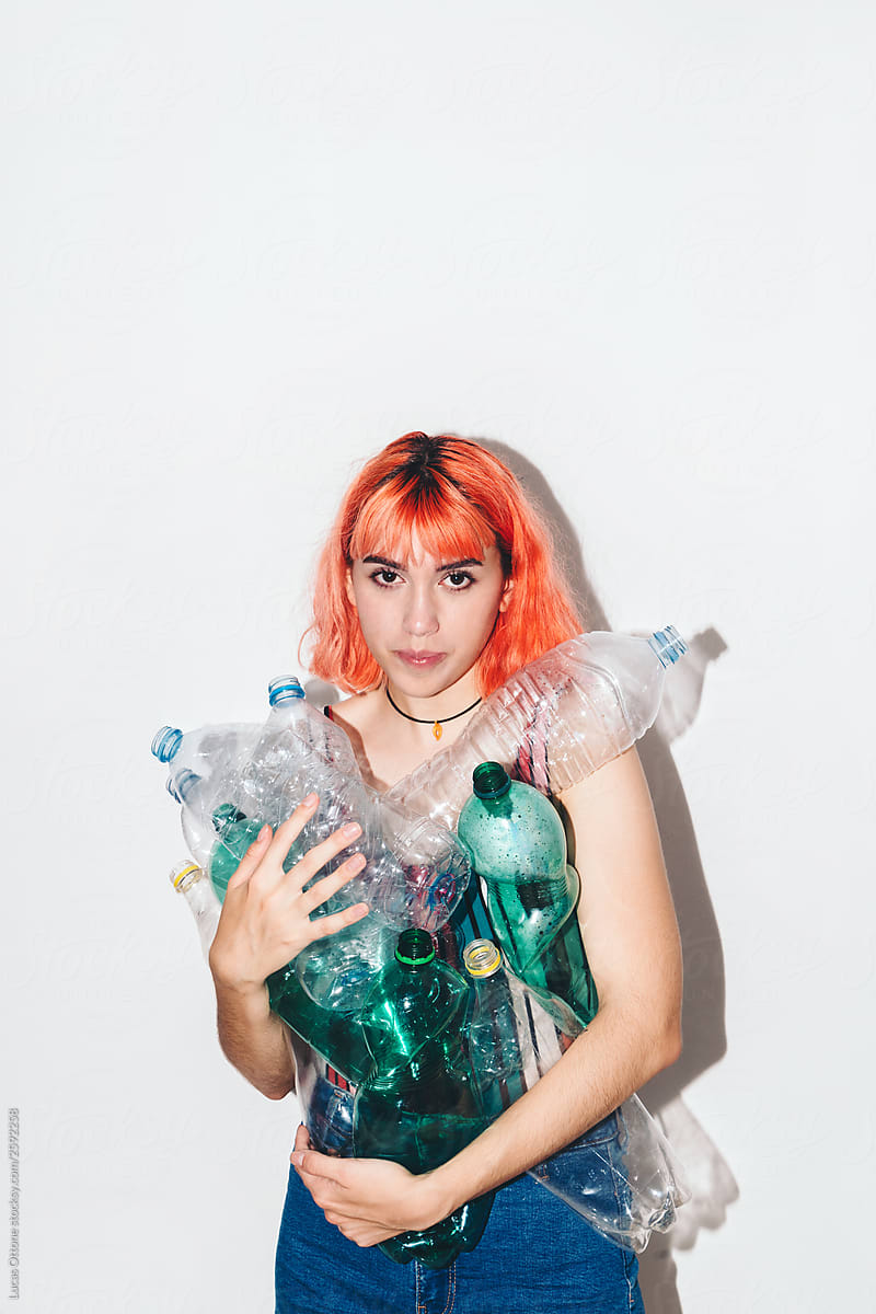 Woman with plastic bottles