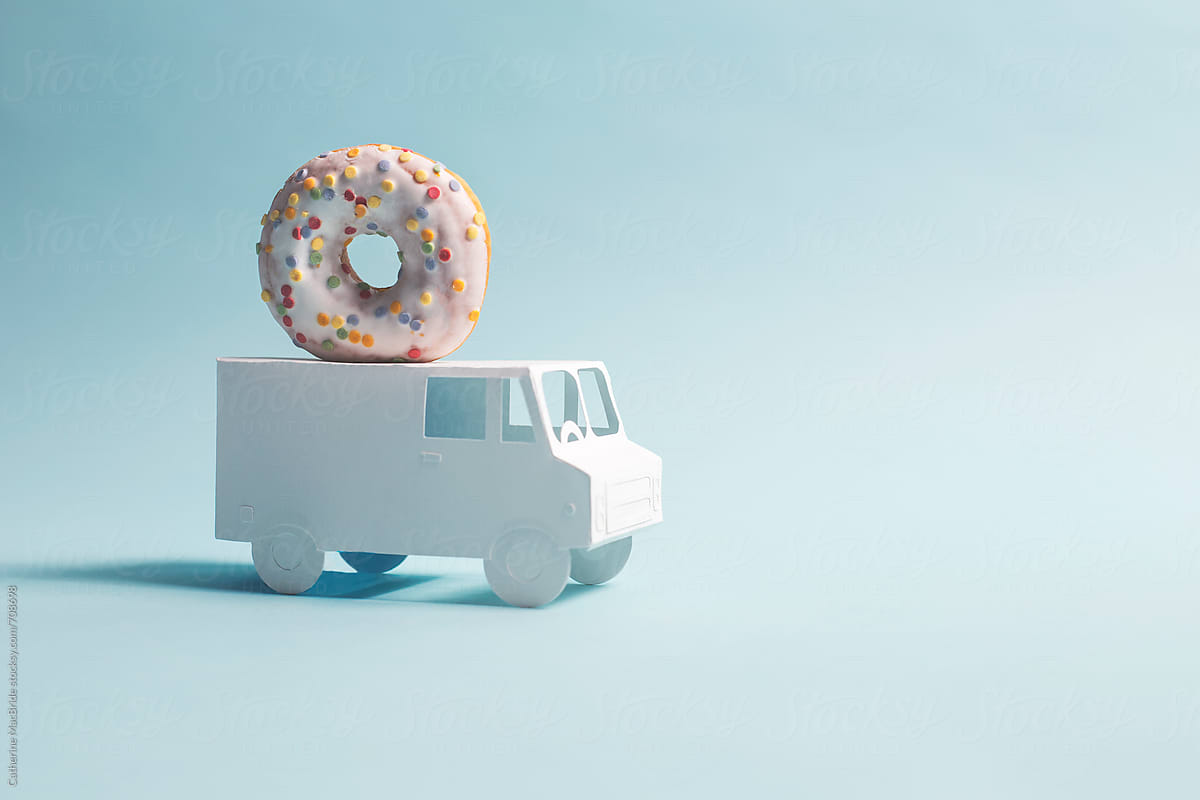 Delivering doughnuts! a little paper craft truck delivers a donut