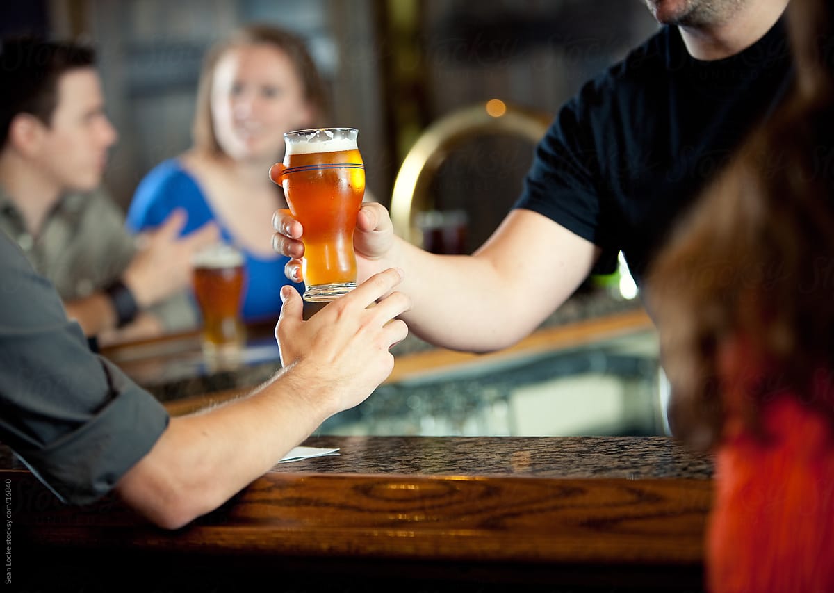 Bar: Handing a Beer to a Customer