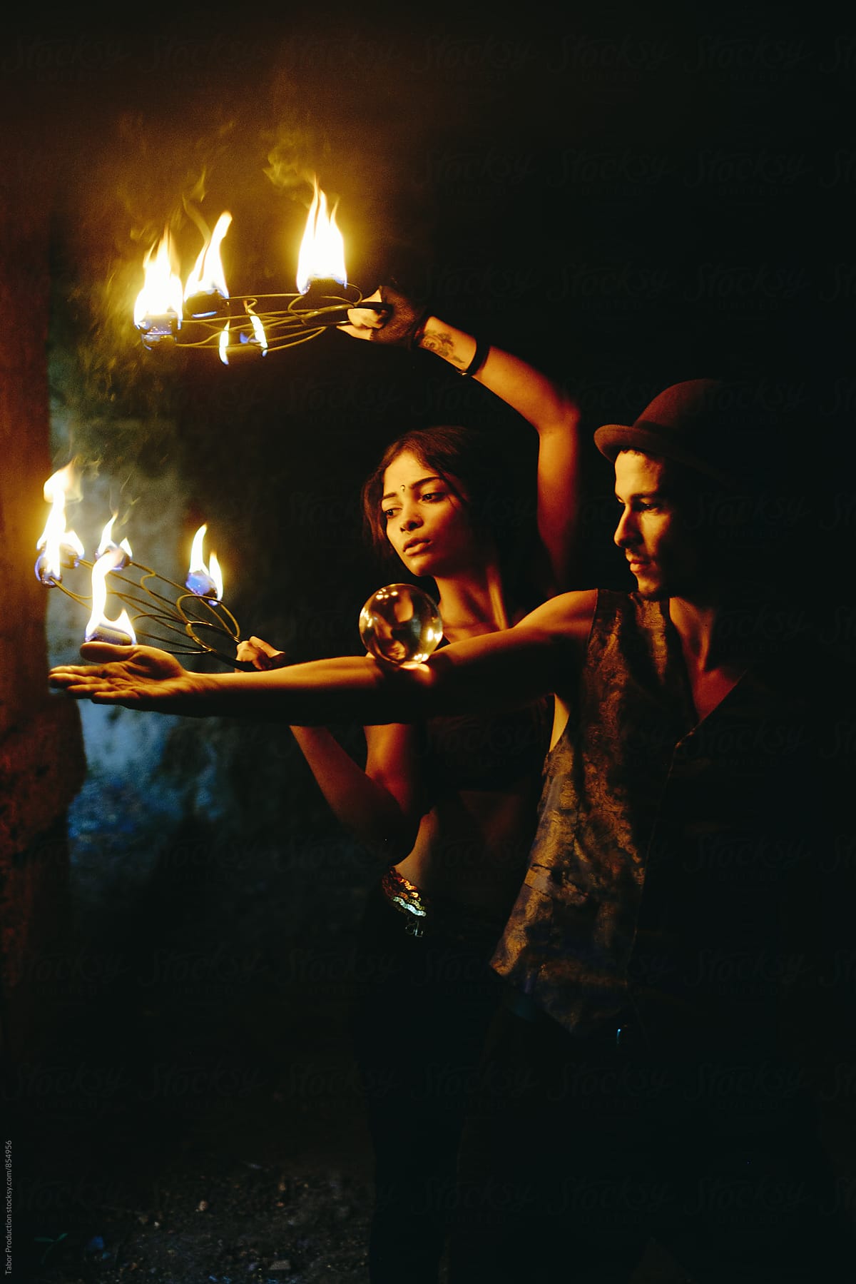 Couple of young fire performers