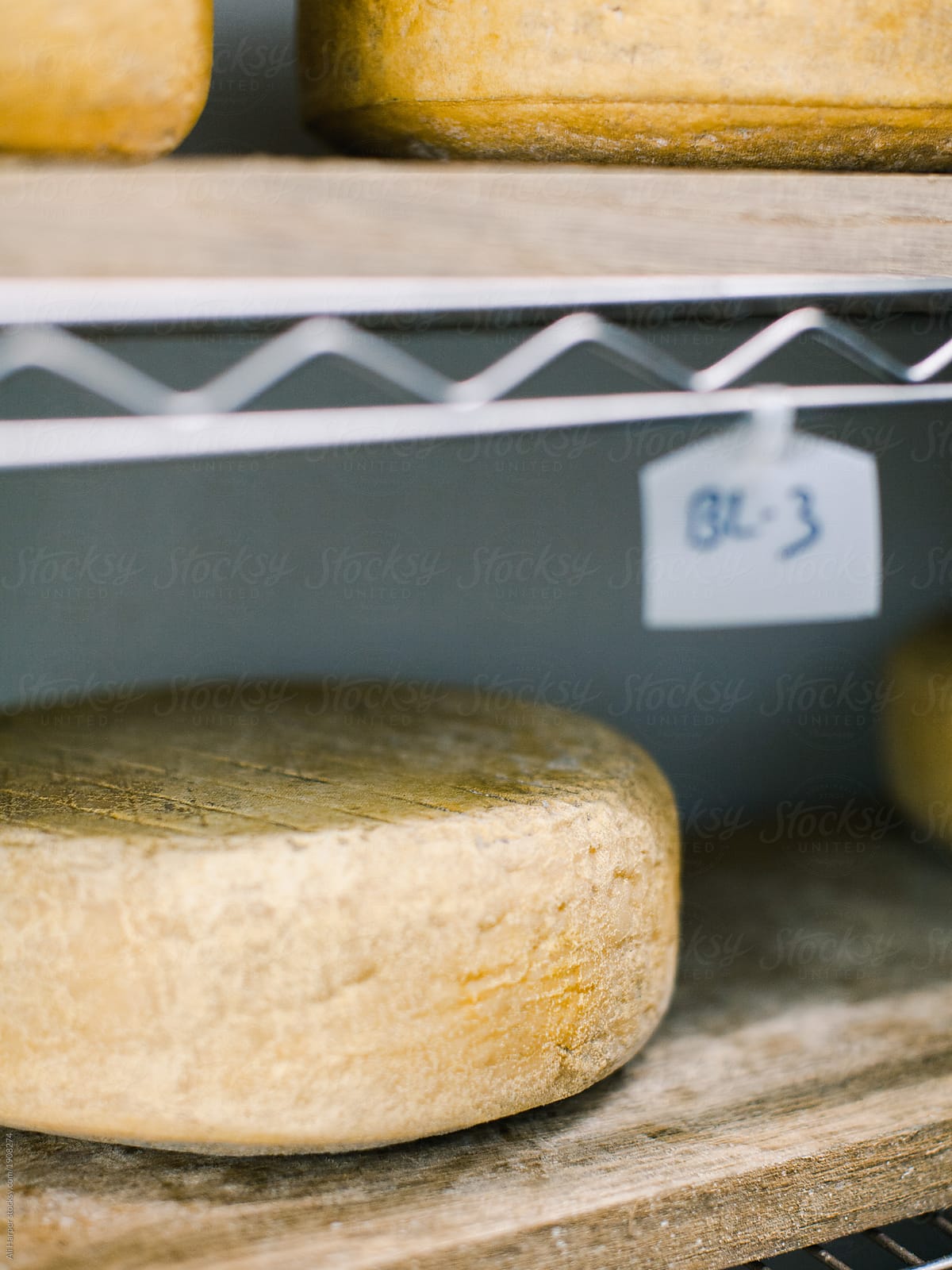 Cheese aging on shelf