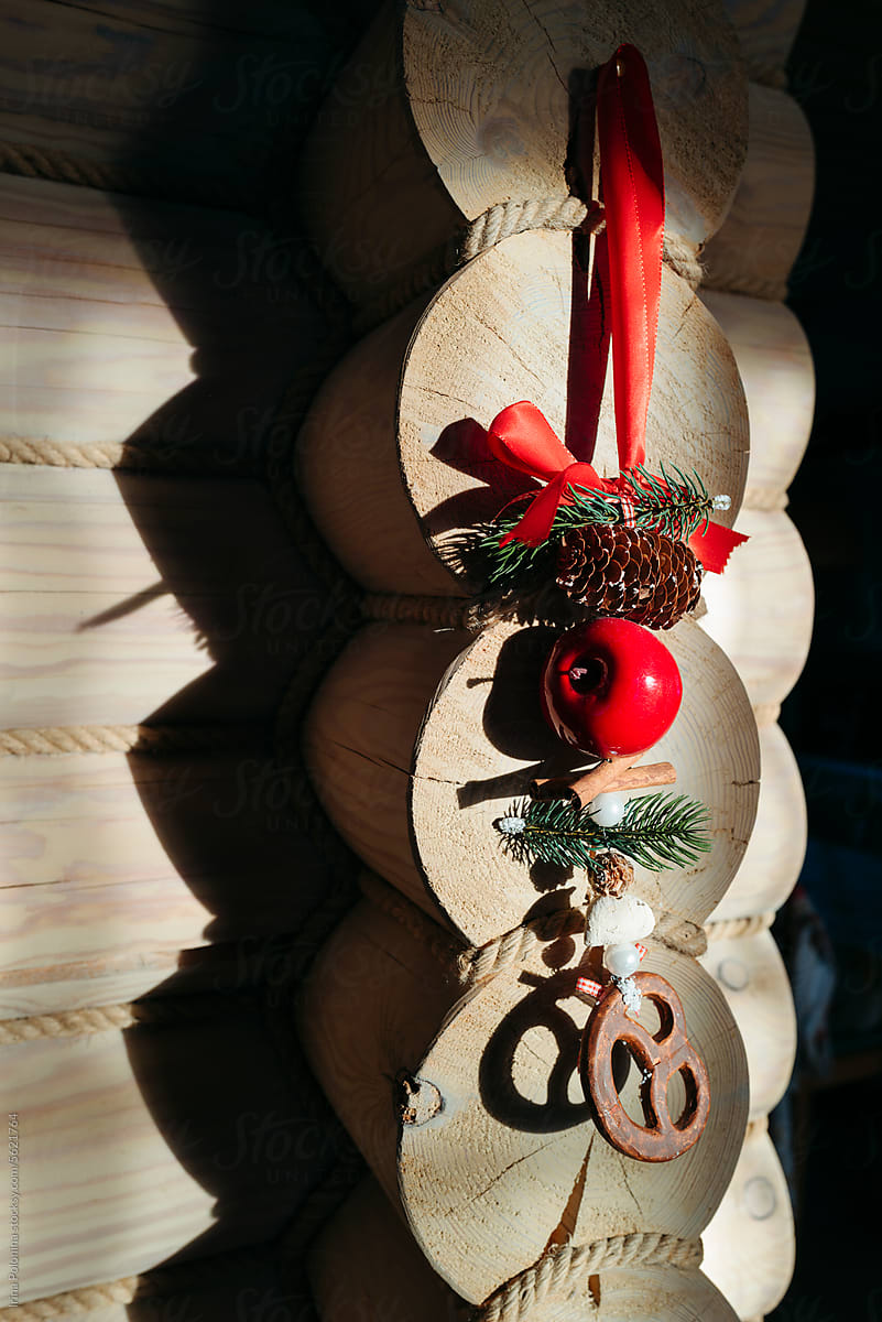 Christmas decoration on wooden wall.