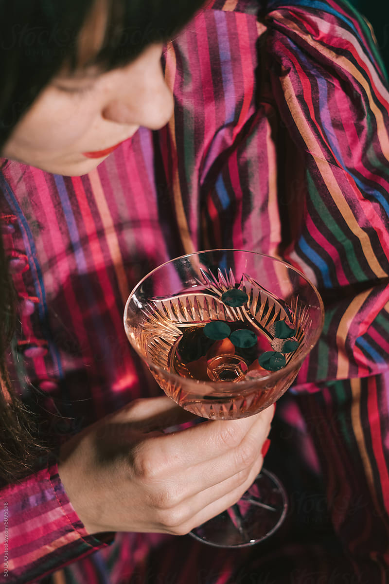 A woman drinks Rose wine