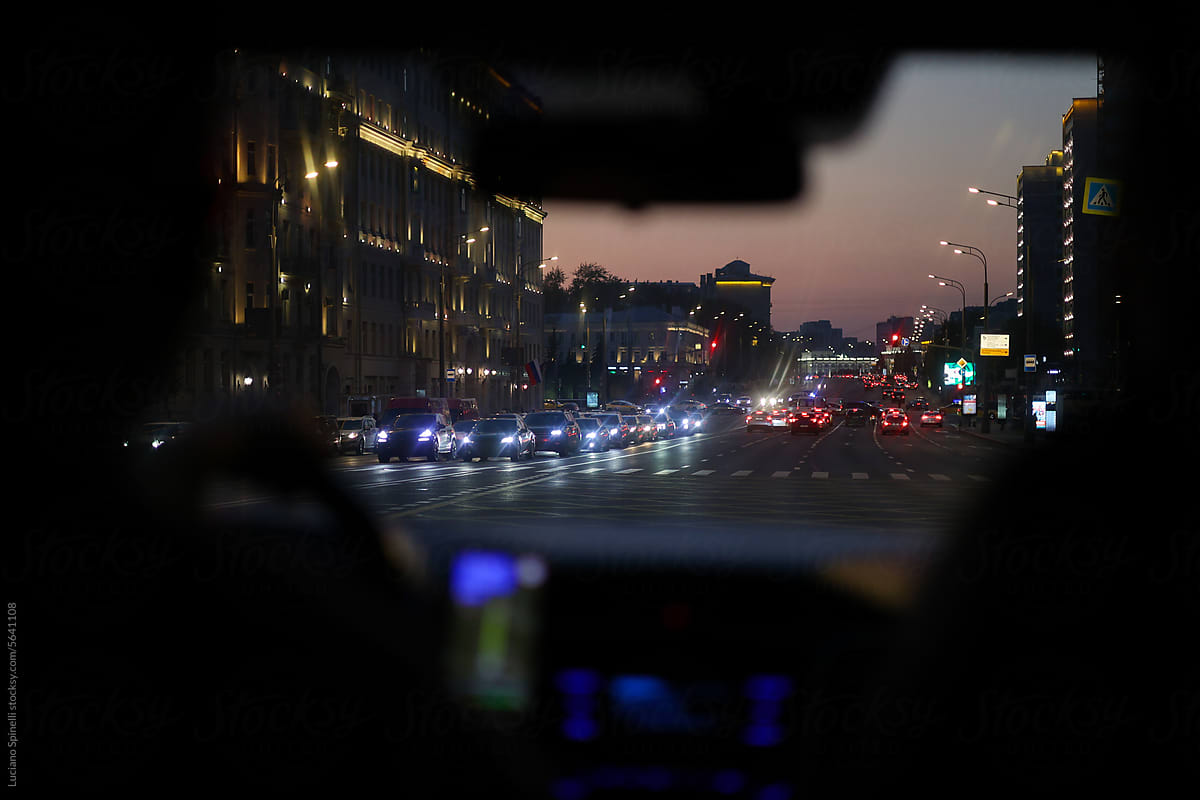 First-person view from inside the car: traffic jam and city lights