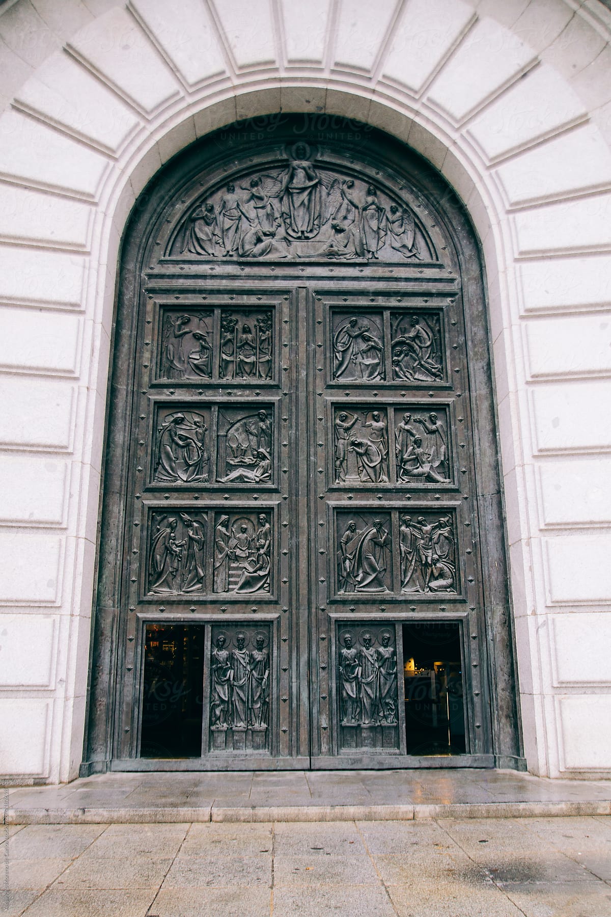 Big door with metal relief sculptures