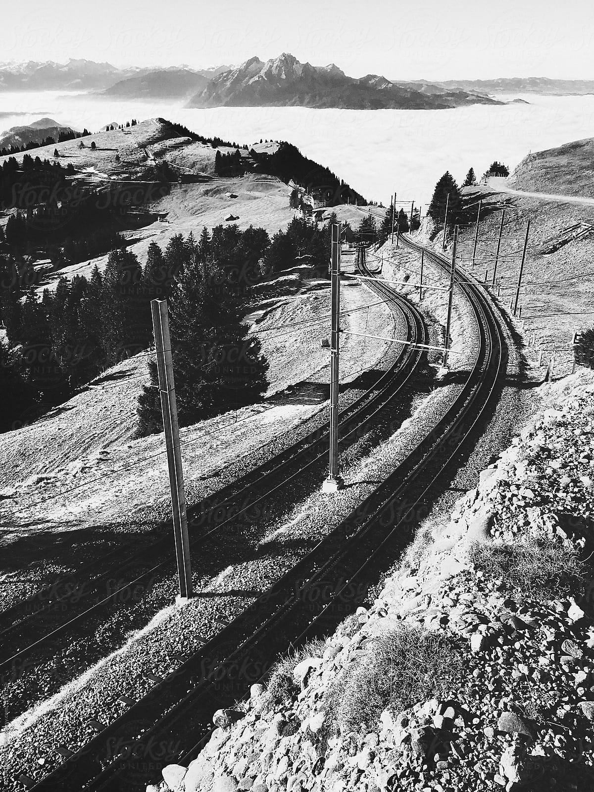 Cogwheel Rail Track on Mount Rigi With Swiss Alps in Black and White