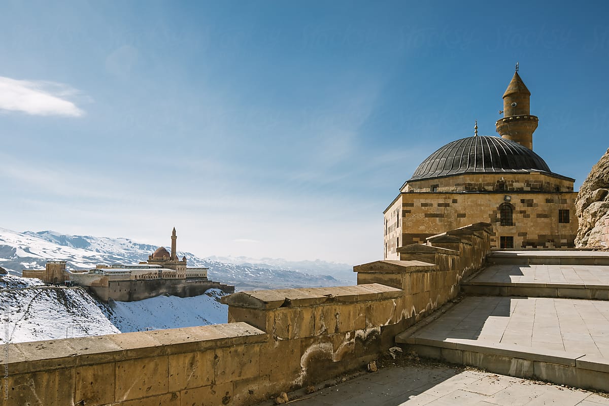 ottoman buildings in snowcovered mountain landscape, ishak pasha palace, turkey