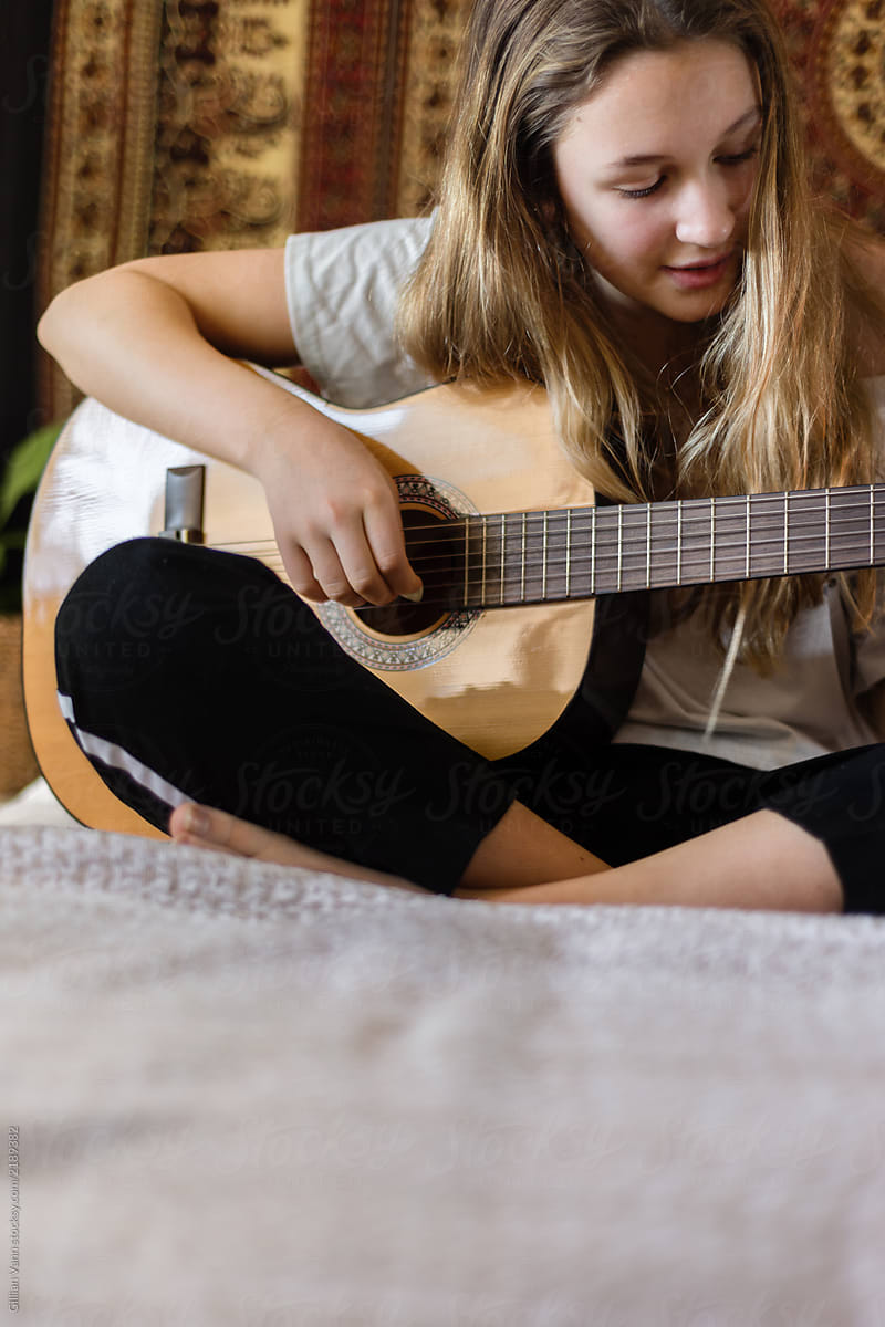 Teen Playing Guitar By Stocksy Contributor Gillian Vann Stocksy