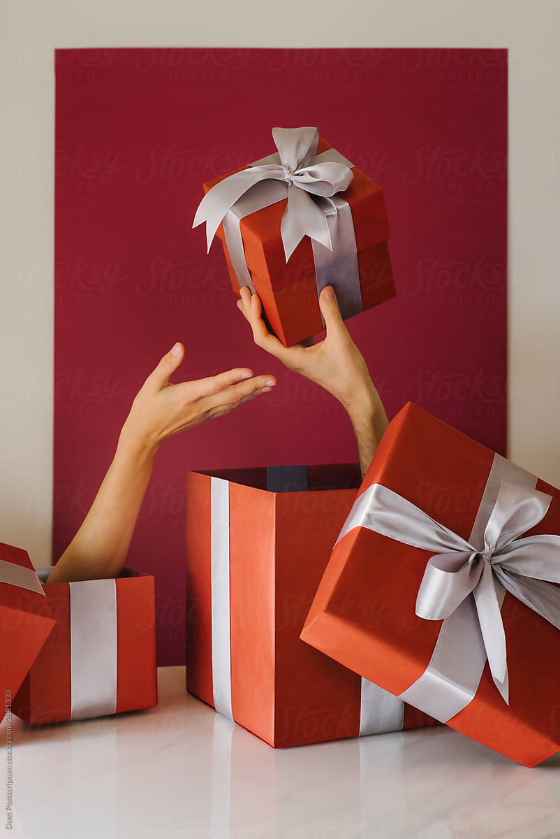 Hands holding a gift box. Christmas concept. Surprise.