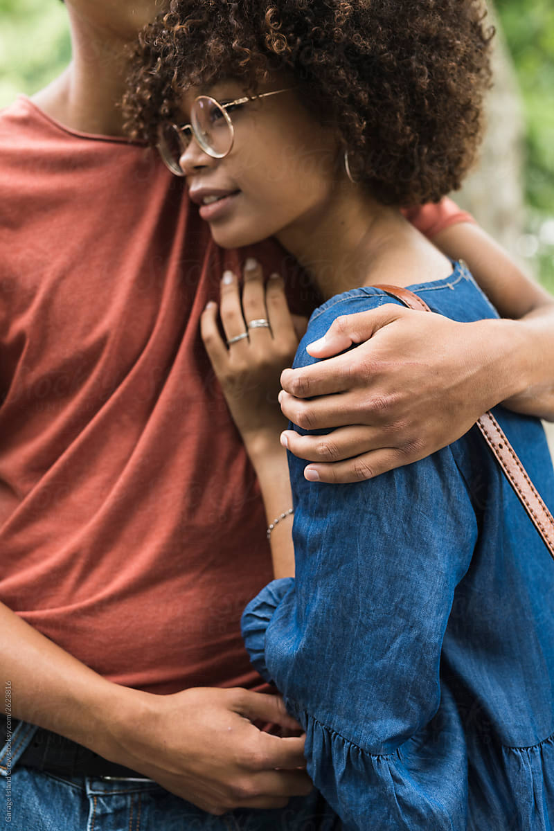 Young black couple hugging