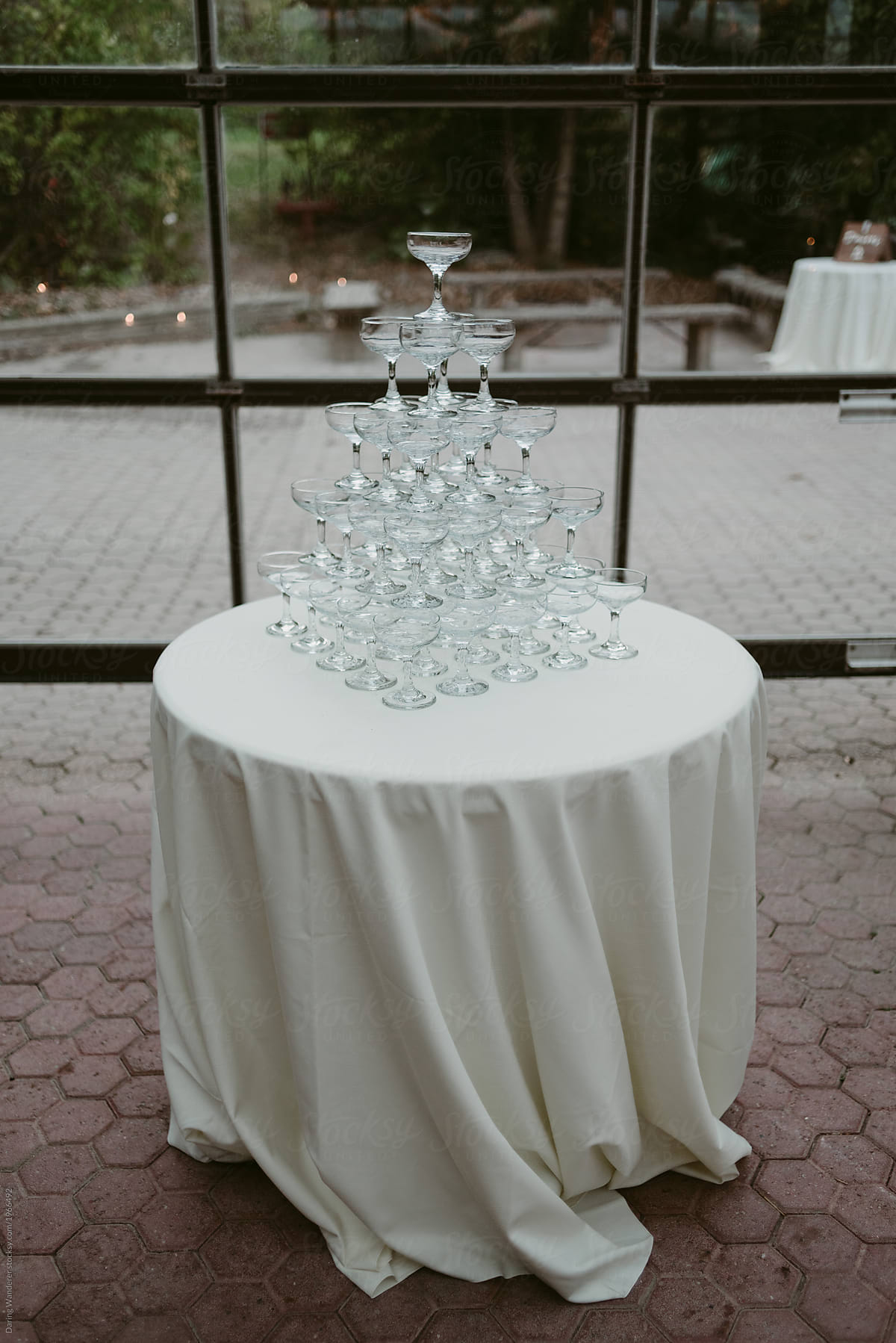 Champagne glass tower on round table
