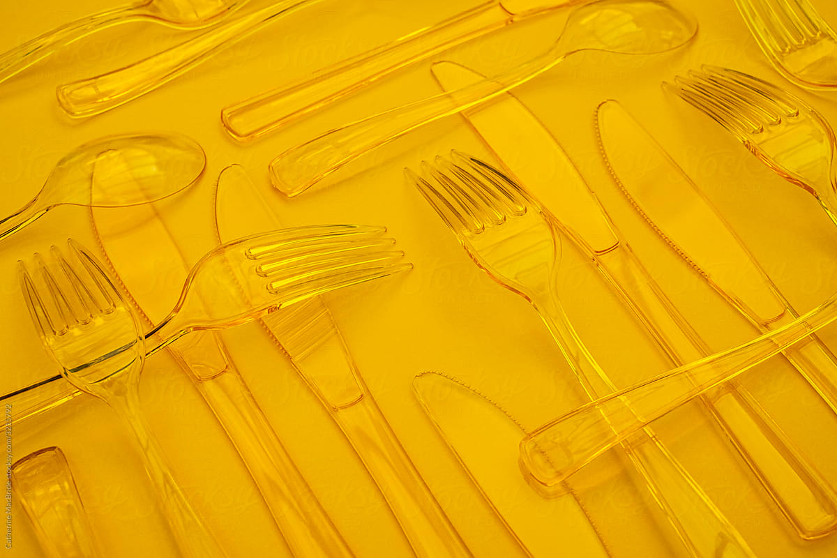 Yellow Cutlery in pleasing pattern