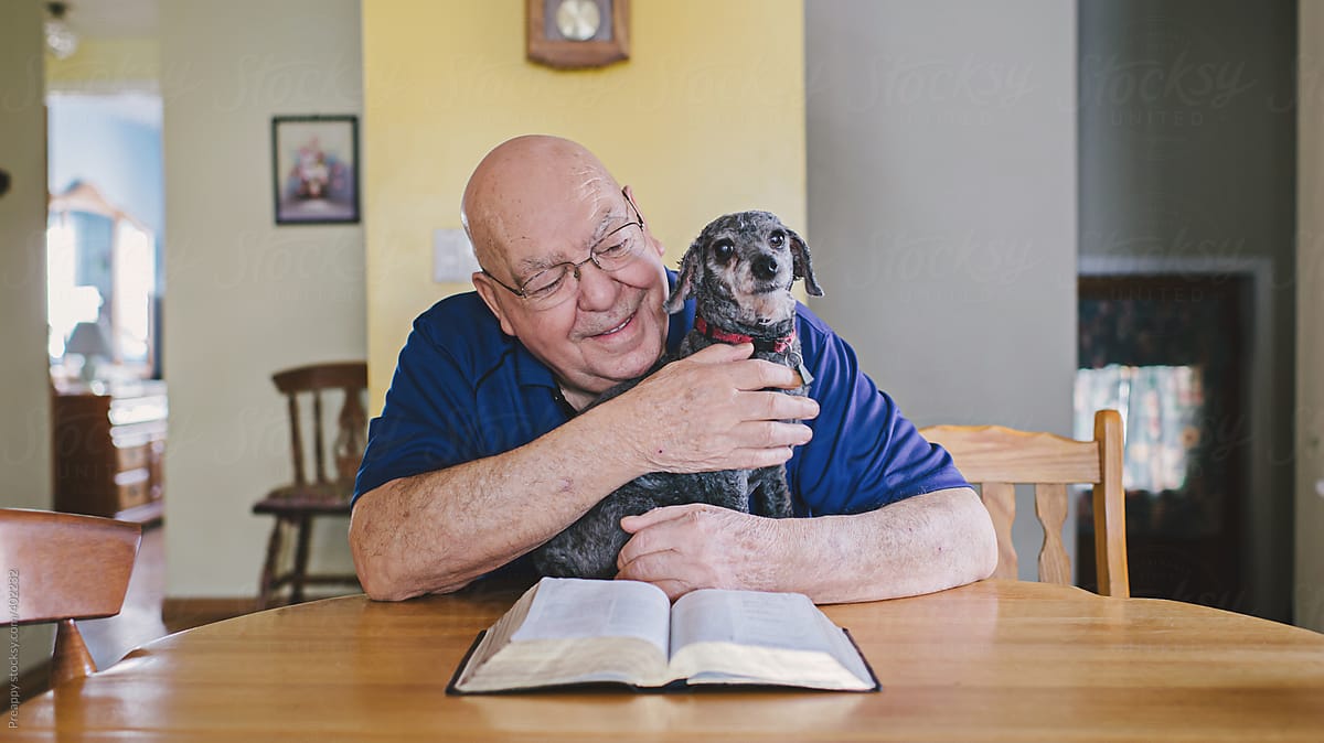 Elderly man and his pet dog
