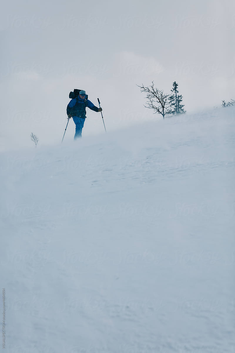 Male Solo Skier in Snow Storm