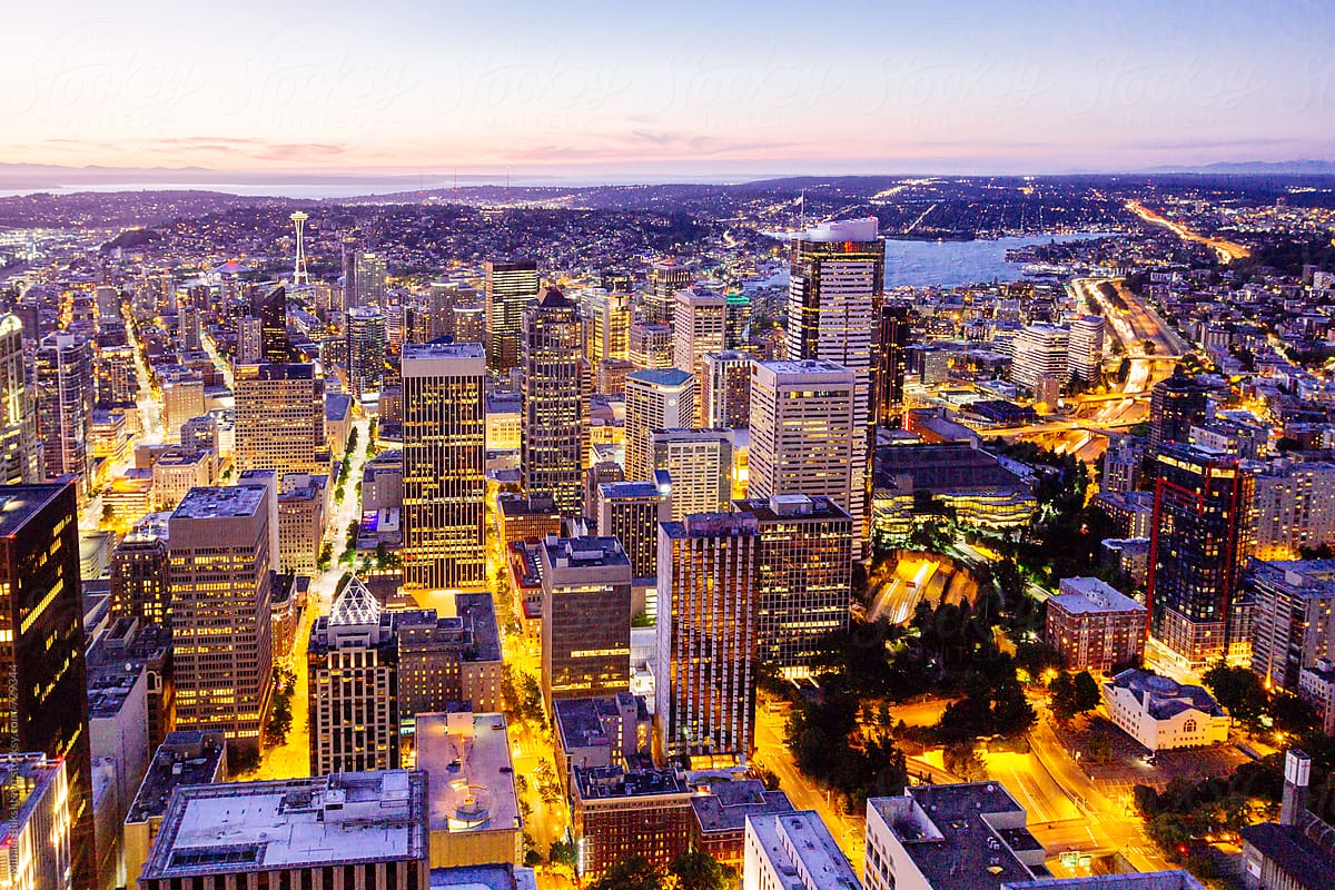 Aerial view of downtown Seattle with Space Needle with beautiful sunset at night