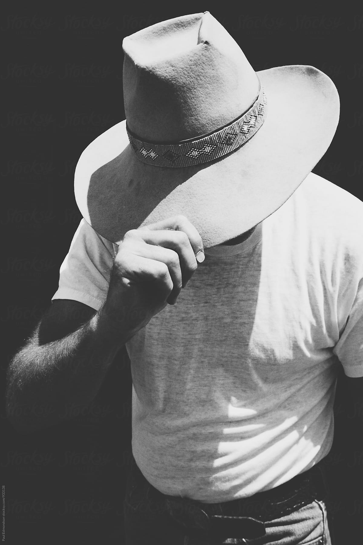 «Portrait Of Cowboy Holding Hat» del colaborador de Stocksy «Rialto ...