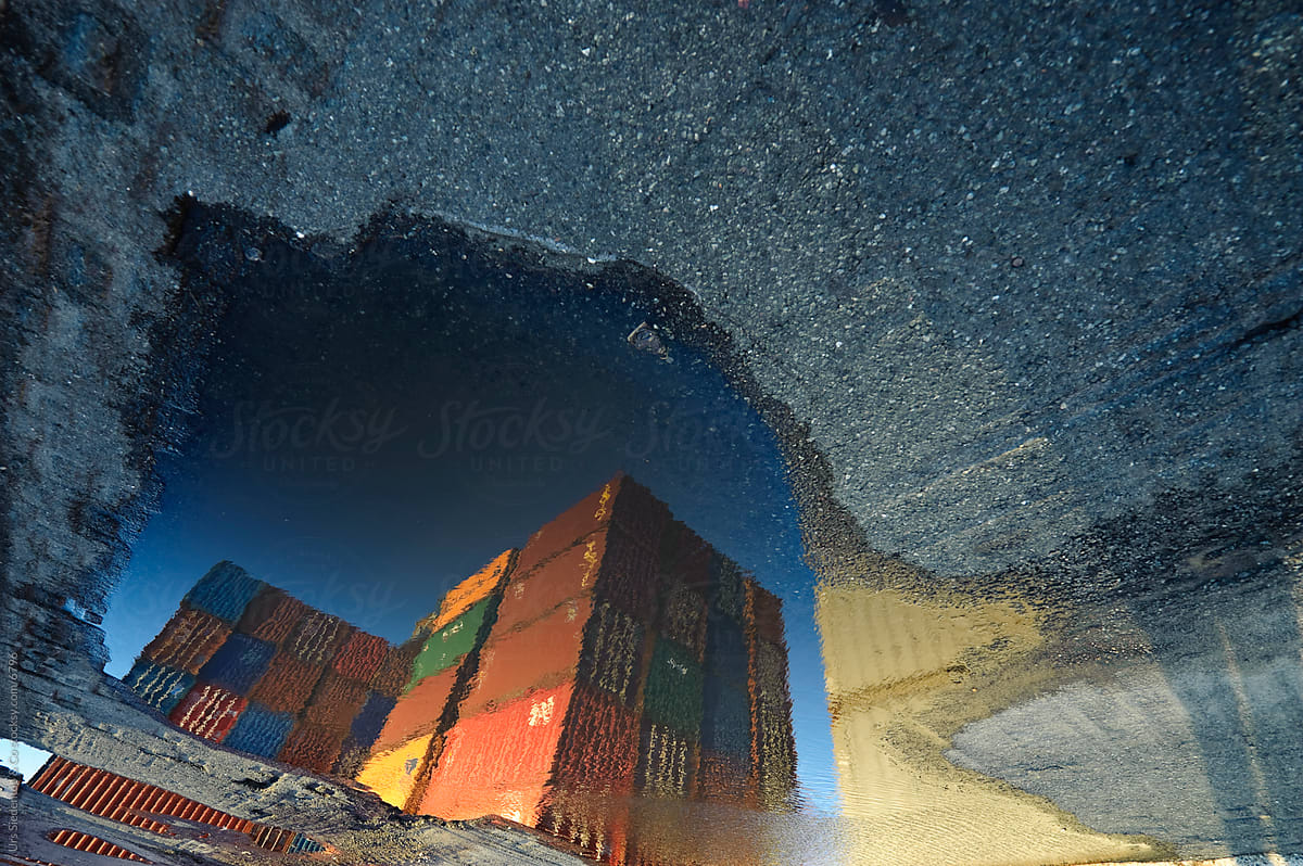 Container reflection in puddle