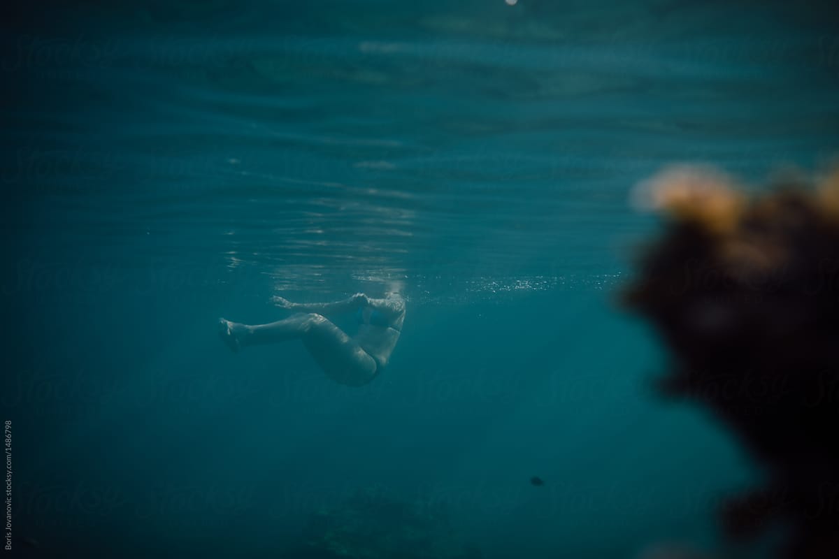 Woman floatng in the sea
