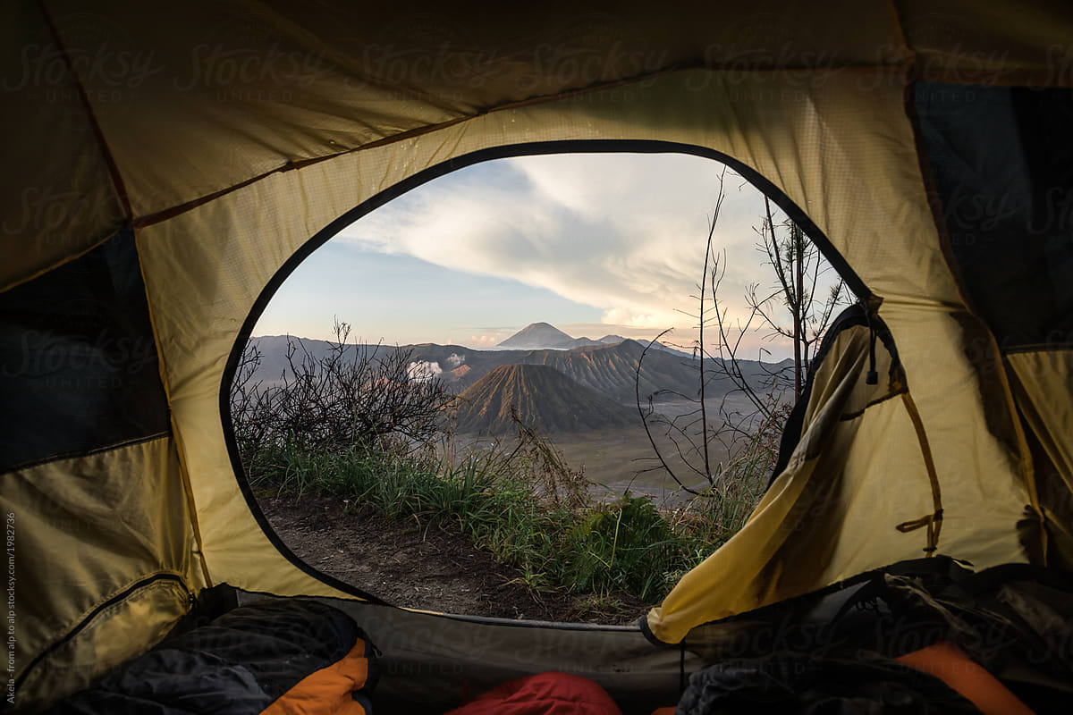 sunrise above mount bromo seen from inside a tent, java, indones