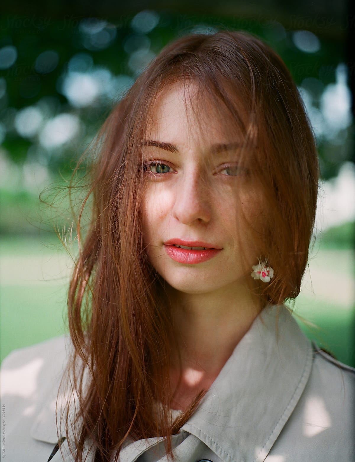 Portrait Of Beautiful Woman With Flower On Hair By Stocksy Contributor Amor Burakova Stocksy 1684