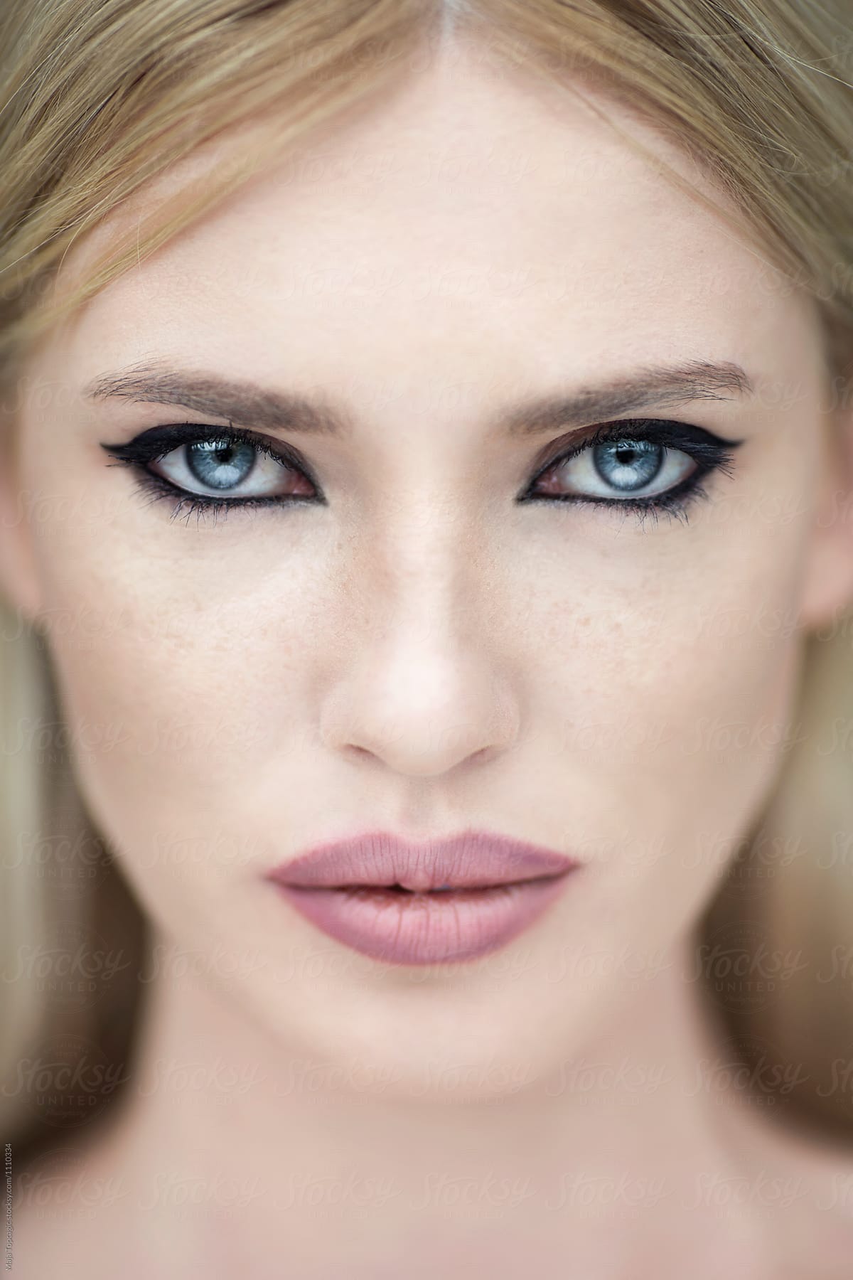 Beautiful Woman With Blue Eyes And Freckles By Stocksy Contributor Maja Topcagic Stocksy