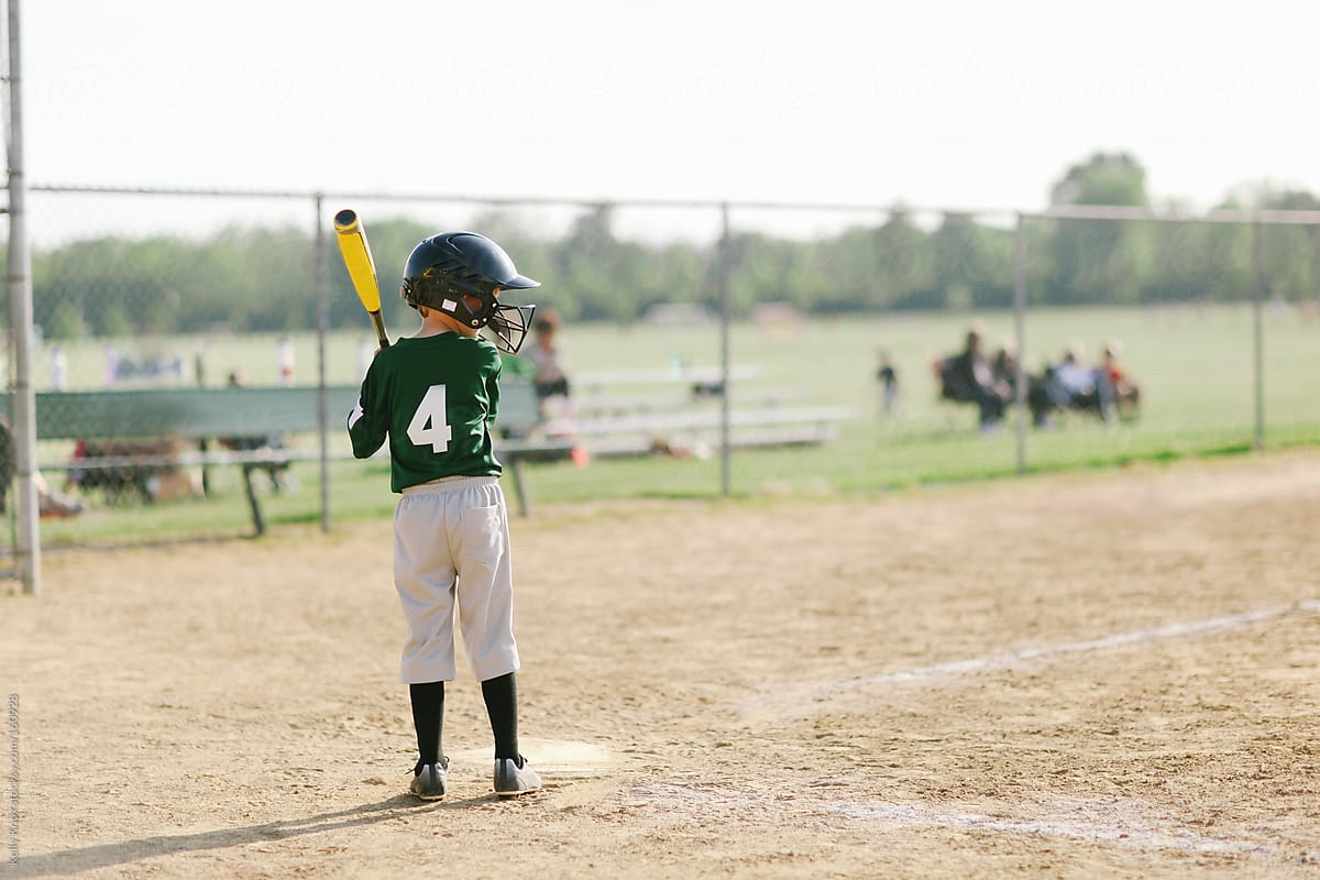 young boy up to bat