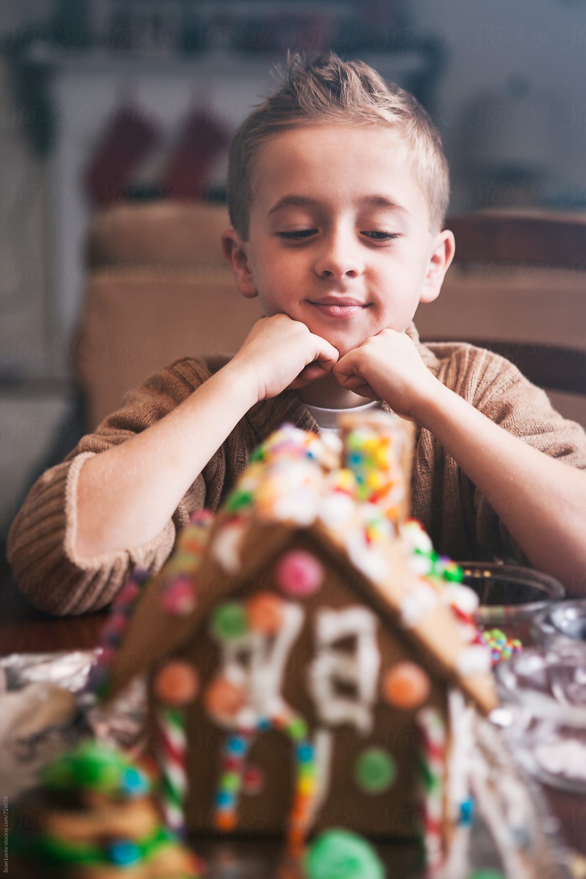 Christmas: Boy Admires His Gingerbread House