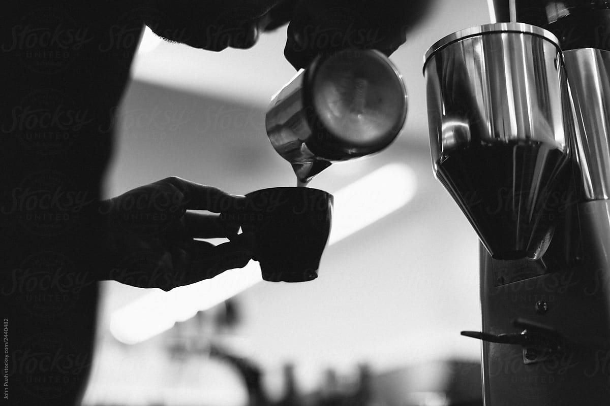 Silhouette of Man pouring coffee