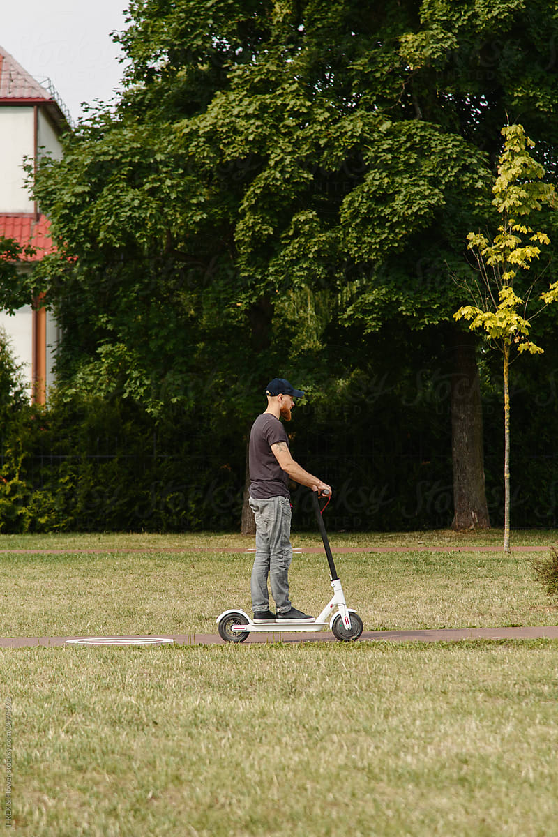 Man on scooter in park