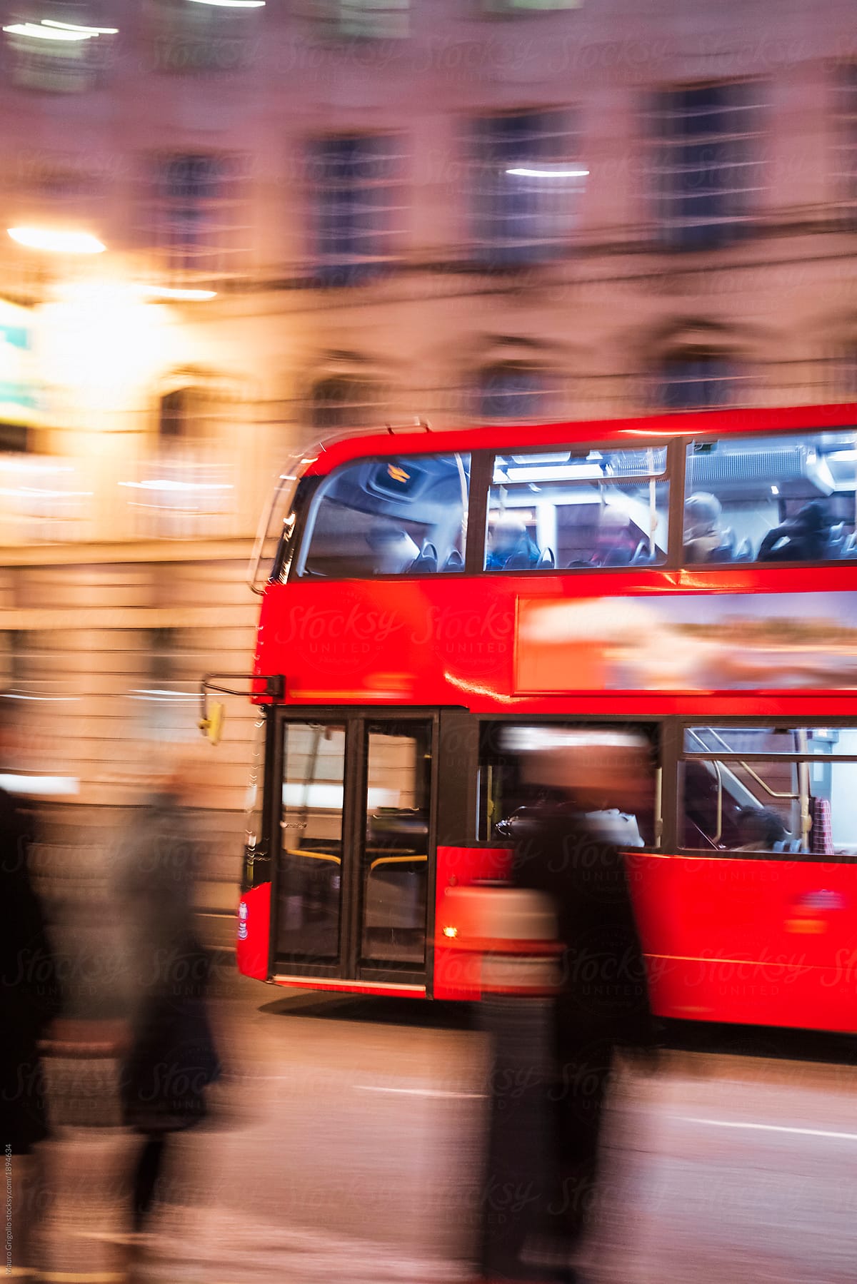 A fast London bus at night