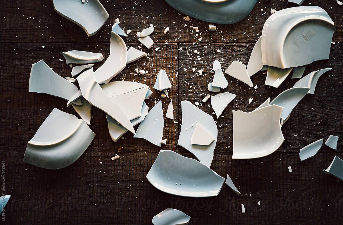 Shards of broken crockery ceramic plates cups and porcelain