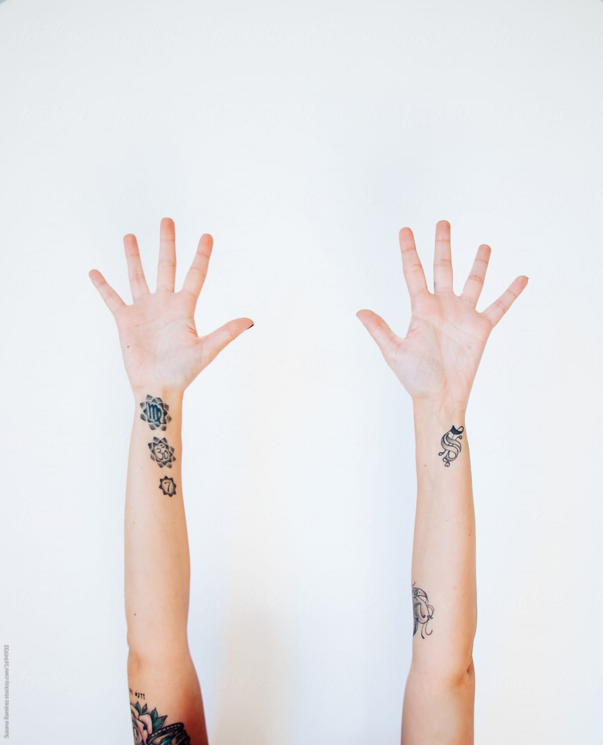 Tattooed Arms Of Woman by Stocksy Contributor Susana Ramírez - Stocksy
