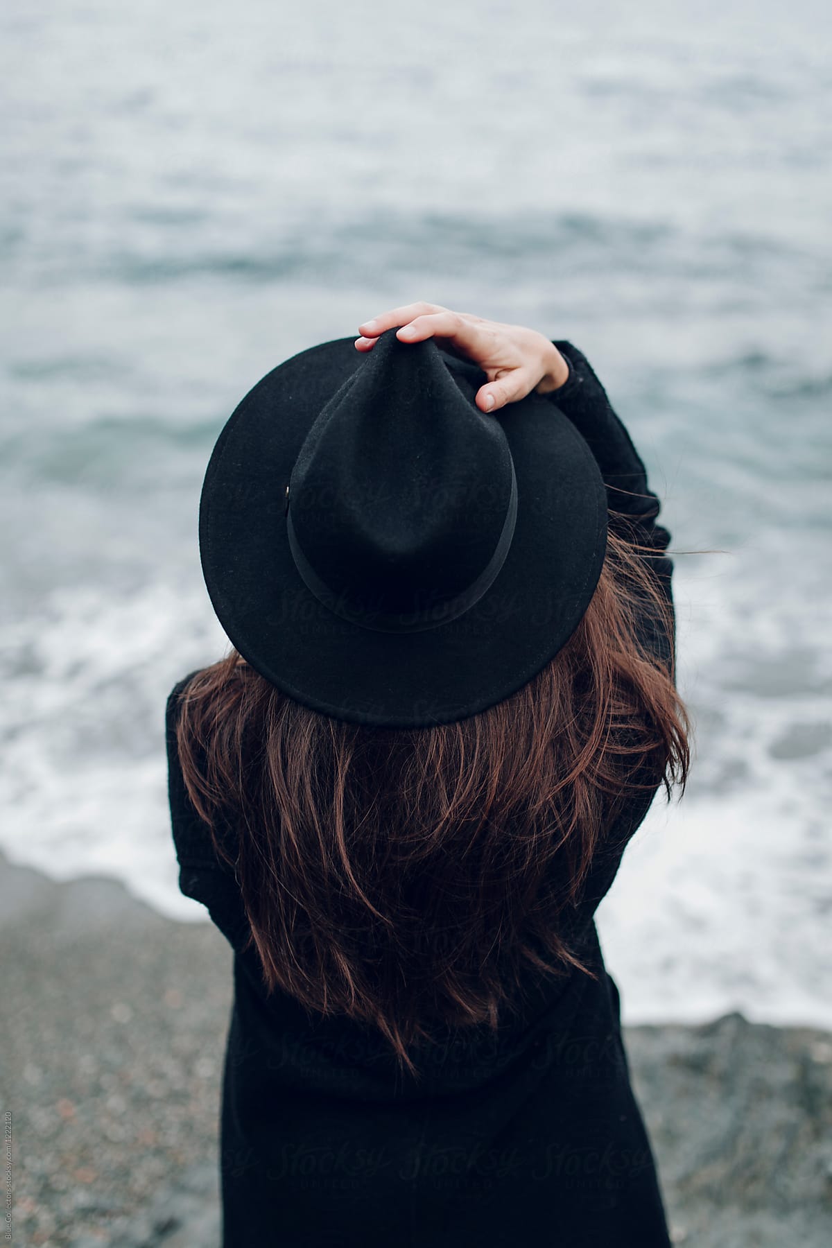 Woman With A Hat Staring At The Sea In A Winter Day By Stocksy Contributor Blue Collectors 