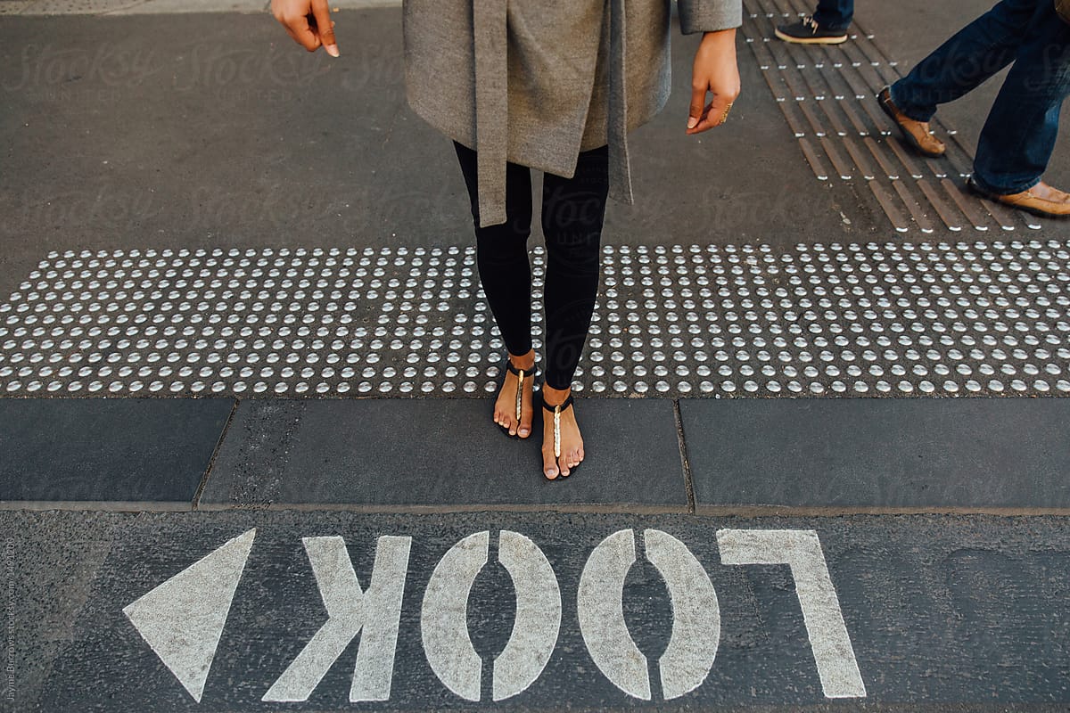 Woman Crosses Australian Streets By Stocksy Contributor Jayme Burrows Stocksy