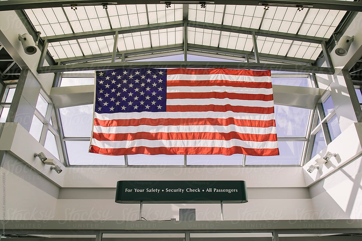 Airport Security Checkpoint With American flag