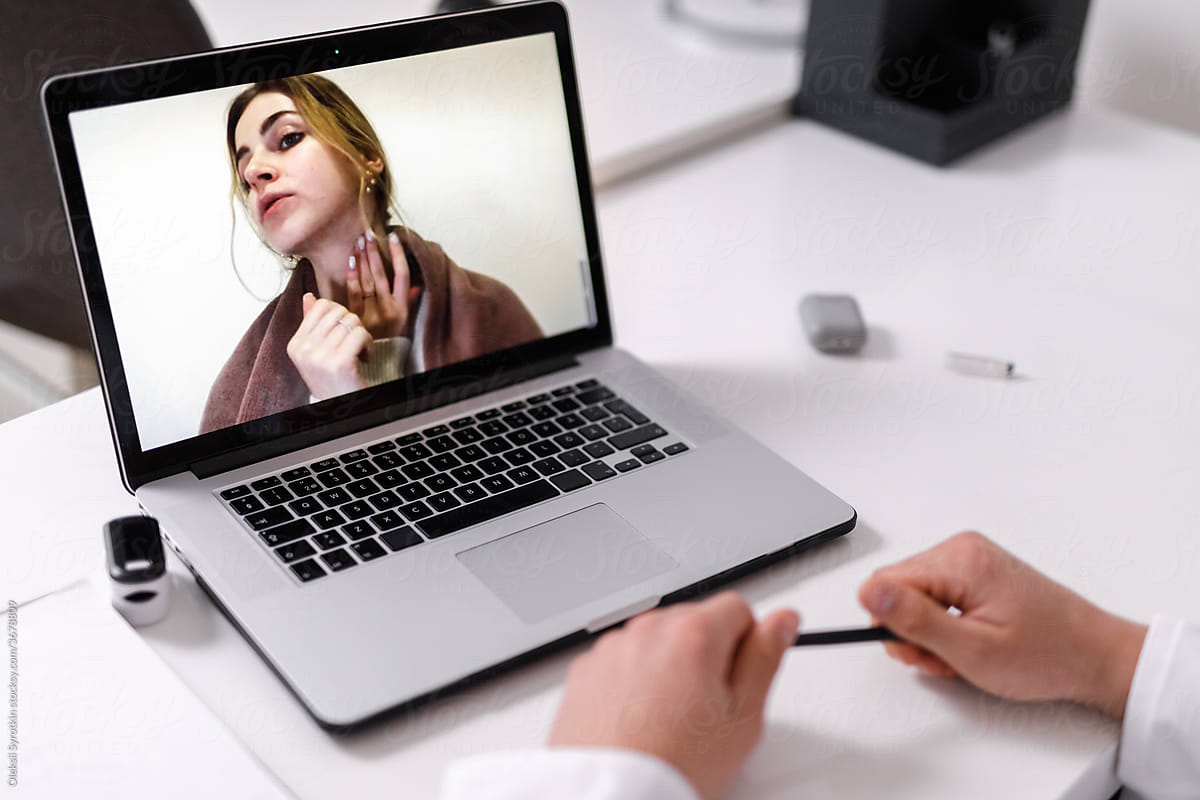 Woman having online session with medical worker