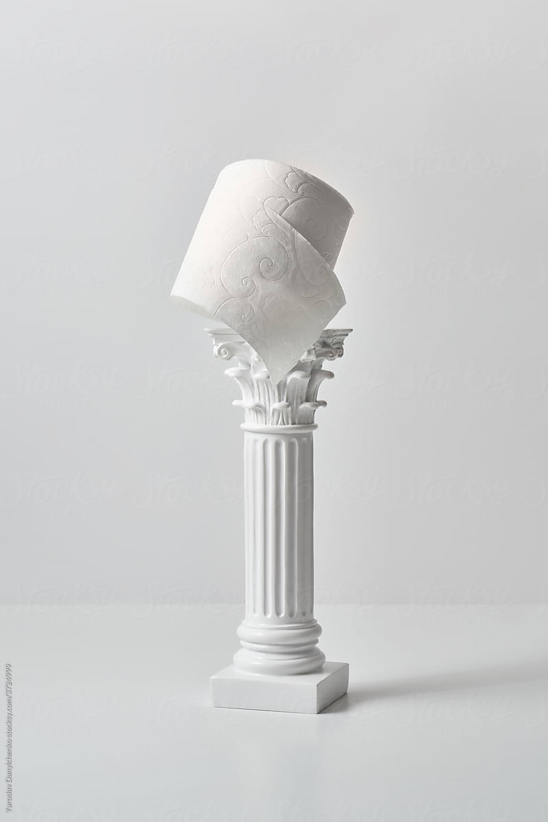 Plaster antique column with toilet paper
