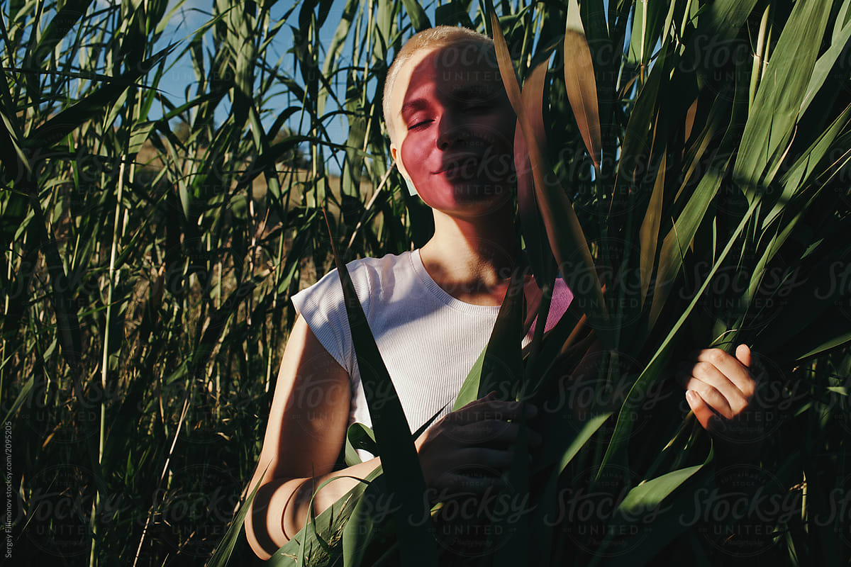 Attractive woman in tall grass