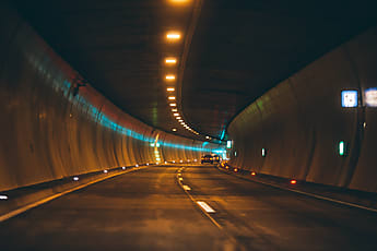 Cars And Lights In A Tunnel | Stocksy United