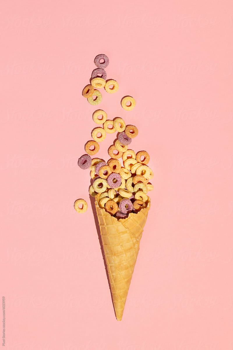Colorful rings / loops breakfast cereal coming out of ice cream cone