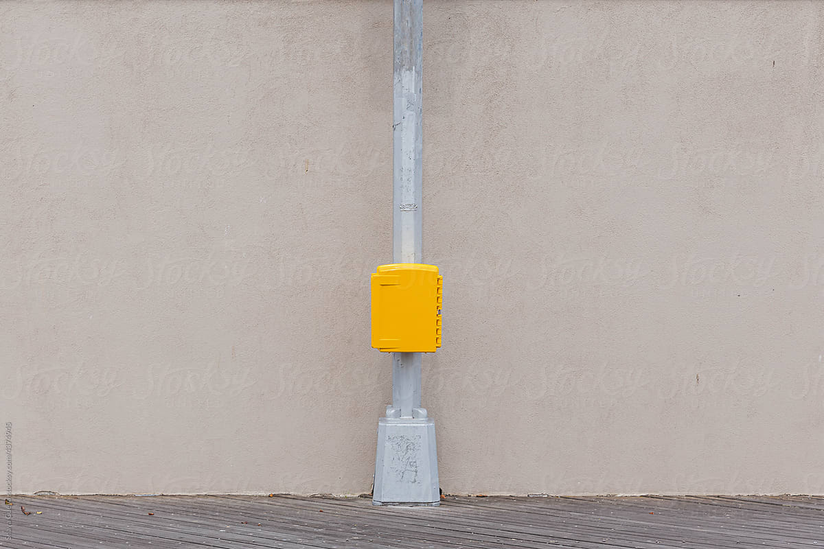 yellow box on a lamp post